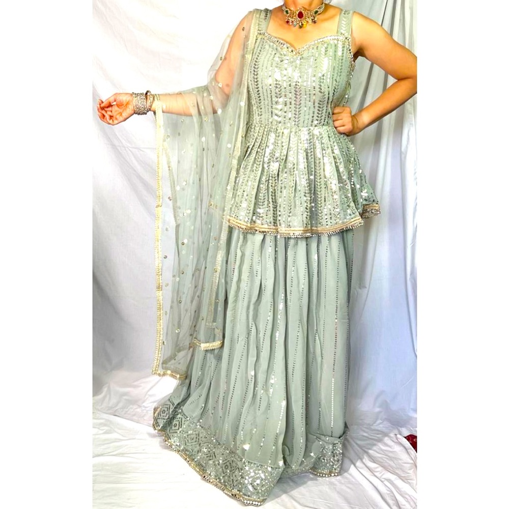 Elegant Green Lehenga with Gold Accents